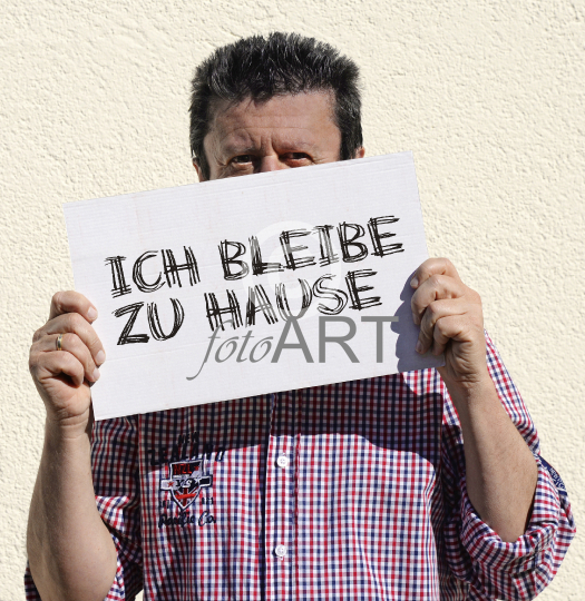 Mann mit Schild
